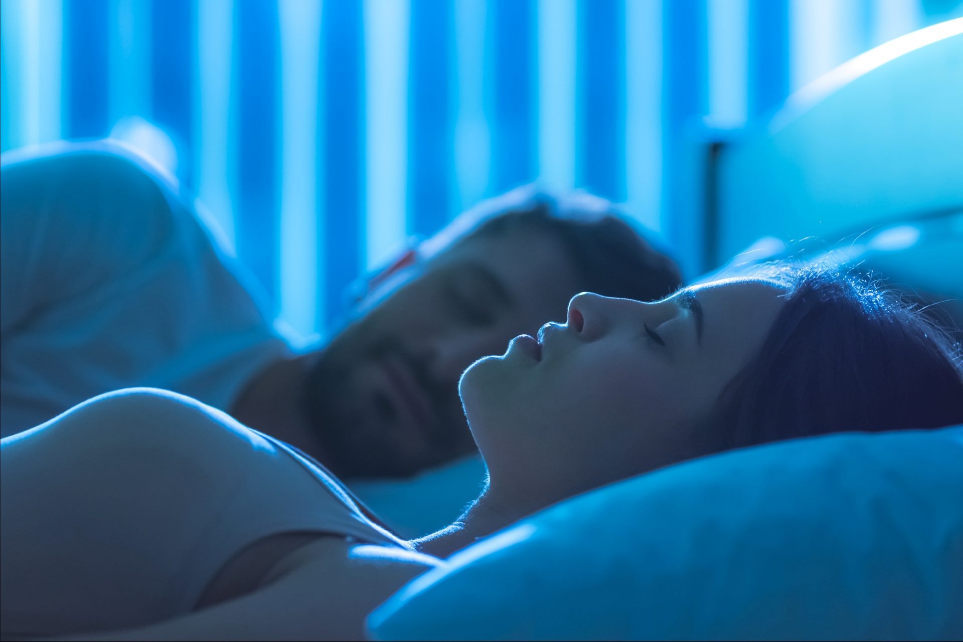 An image of a couple sleeping deeply and peacefully.