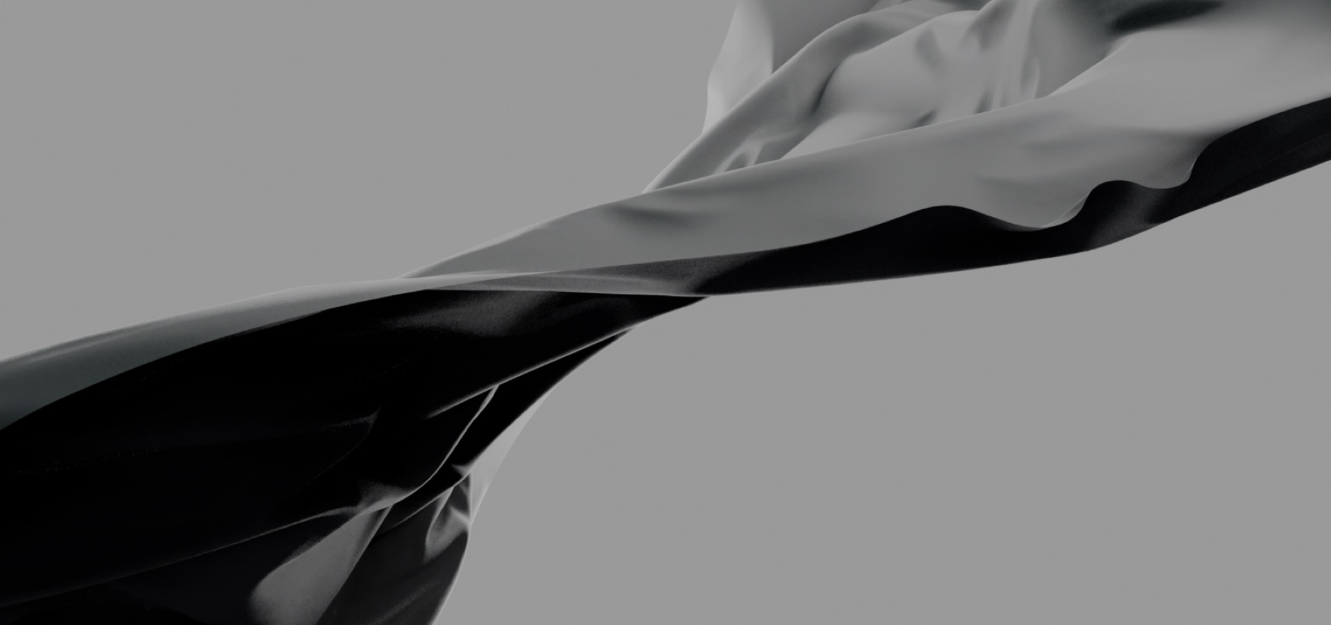 twisting grey ribbon contrasts elegantly against a soft grey background, creating a sleek, modern look