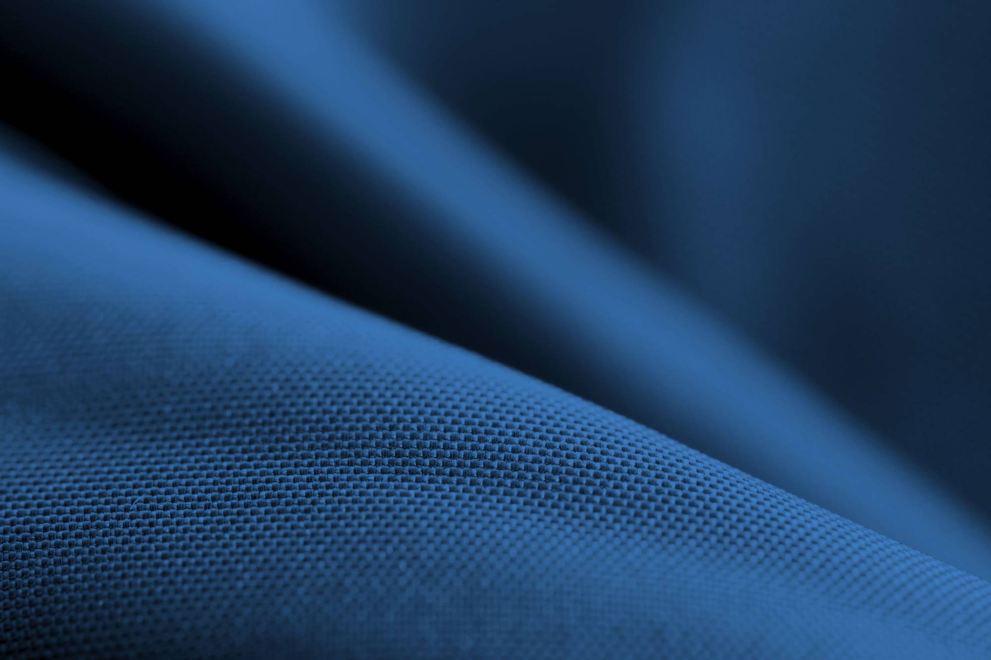 High-quality deep blue mattress fabric representing BekaertDeslee brand identity
