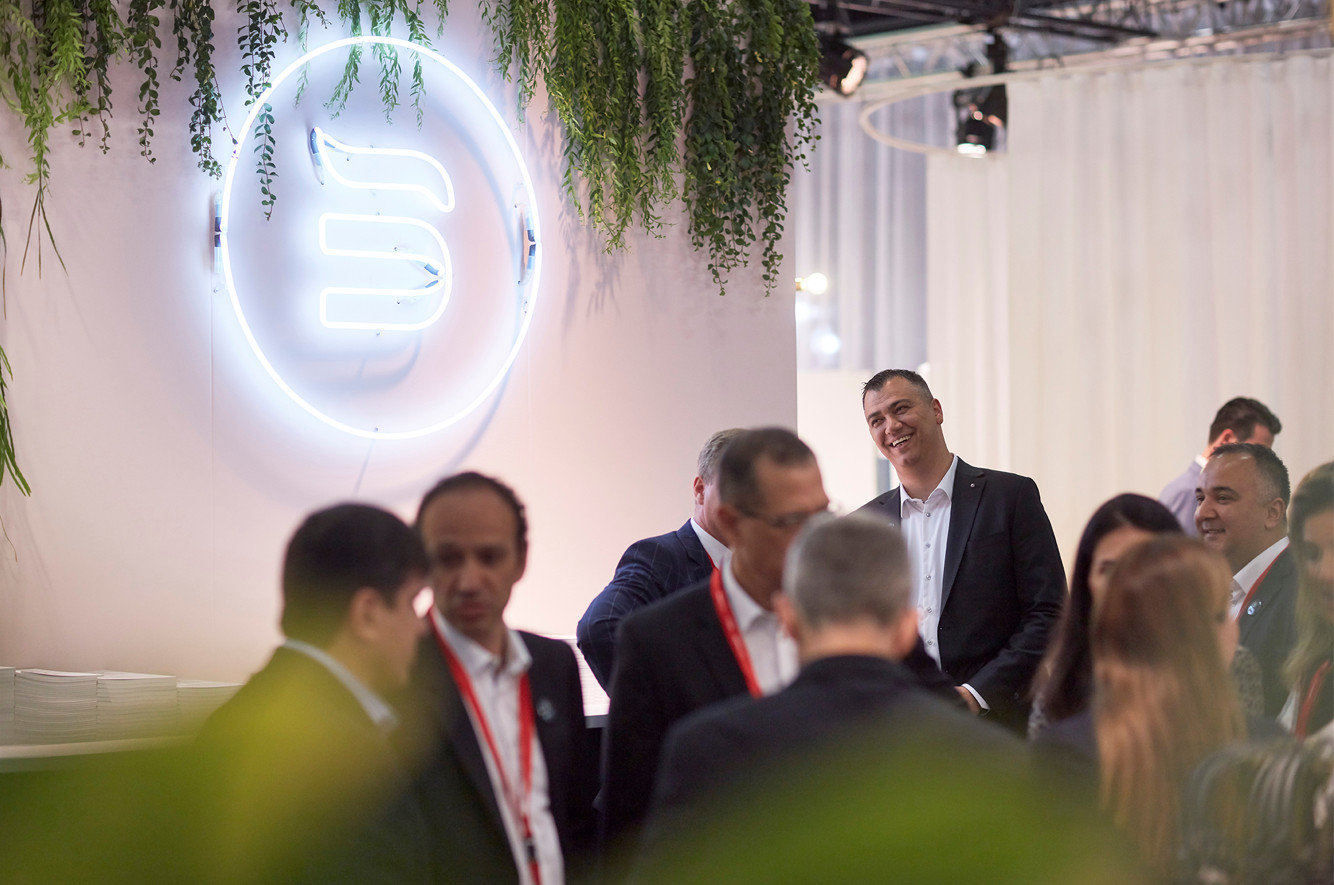 BekaertDeslee employees networking in an industry event.
