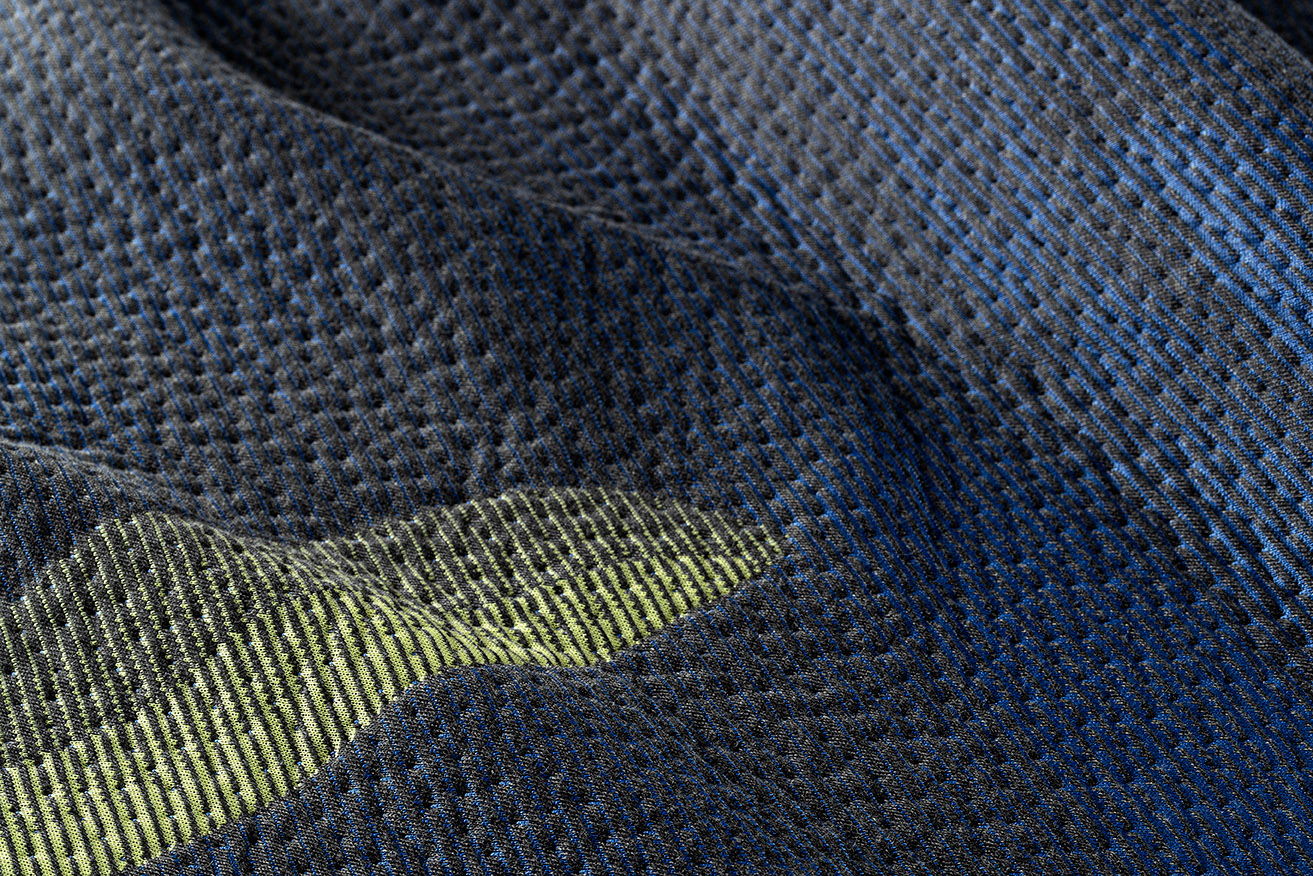 Dark navy blue fabric with a subtle touch of dark yellow, offering a sophisticated contrast. 